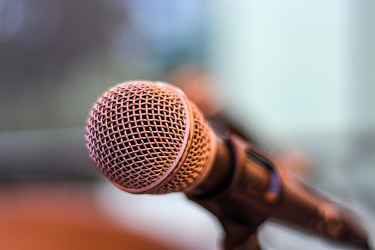 A microphone against warm wood